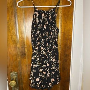 Fun black floral romper, so comfortable and easy for summer, size small